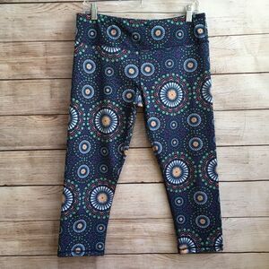 SCORPIO SOL CROPPED LEGGINGS IN BLUE PRINT